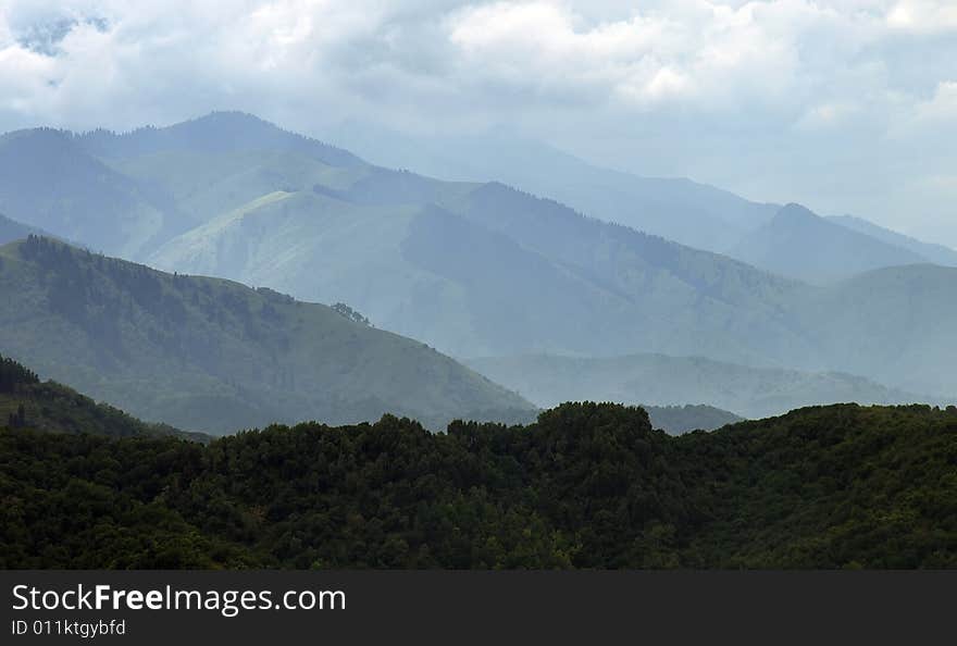 Summer rain in the mountains. Tien Shan. Kazakhstan. Summer rain in the mountains. Tien Shan. Kazakhstan.