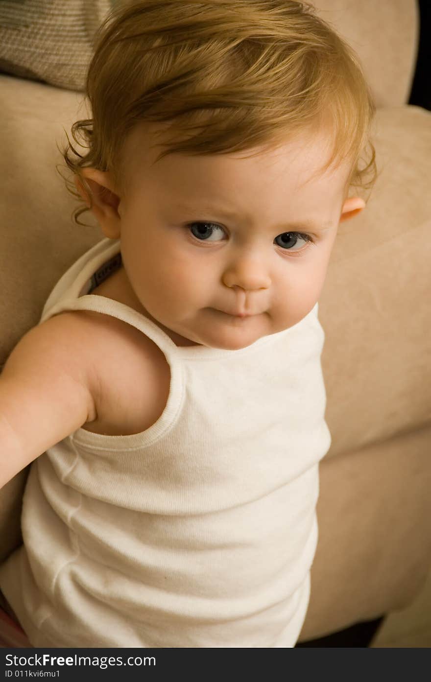 A baby girl having fun playing