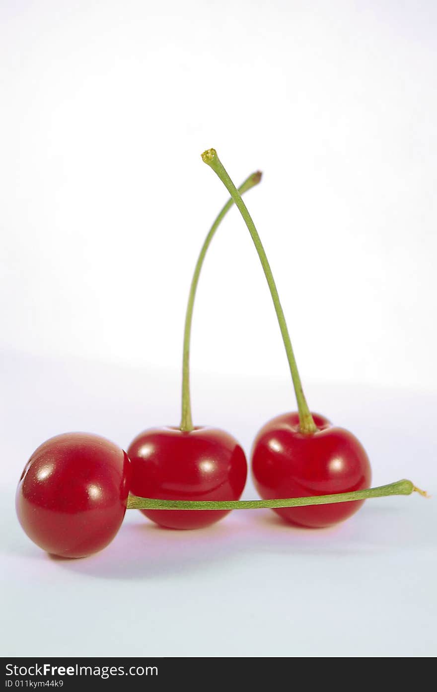 Three Red Juicy Cherries