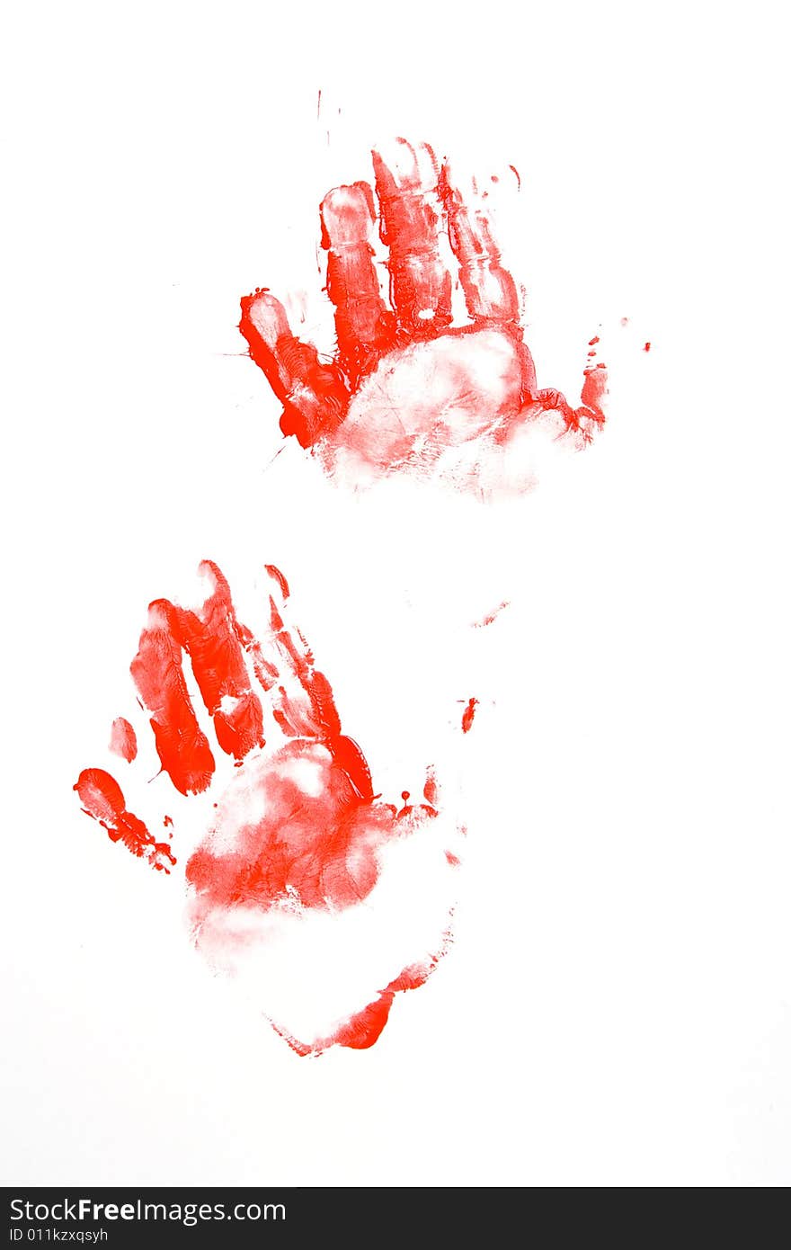 Hand prints in red on the wall