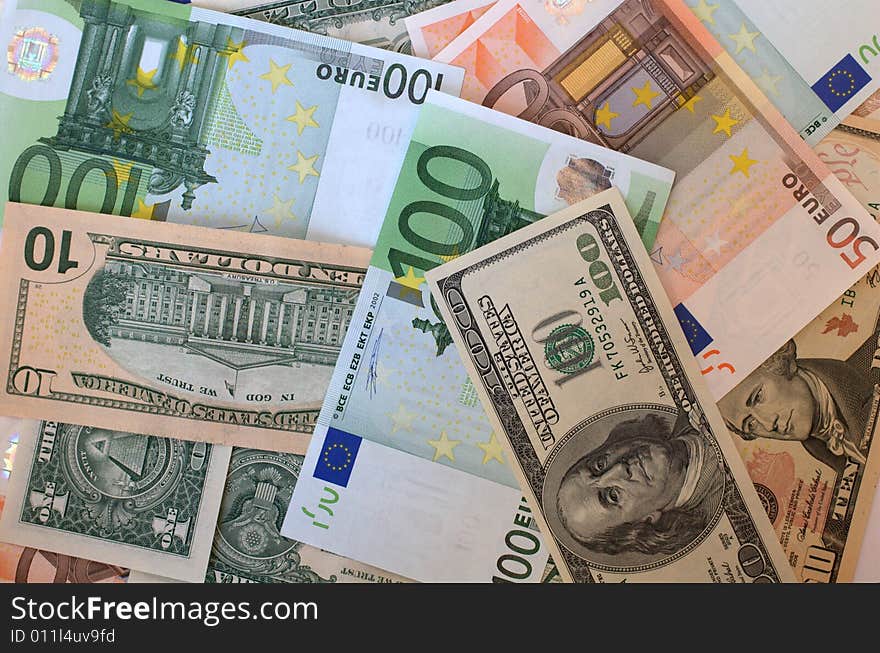 Euro and american paper money as a backf\ground. Euro and american paper money as a backf\ground