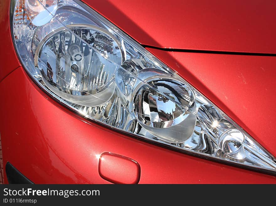 Beautiful eyes red car. light