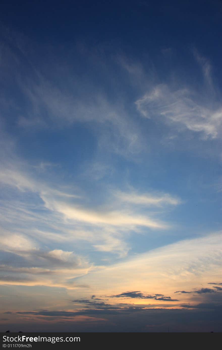 Evening summer clouds on blue skies. Evening summer clouds on blue skies.