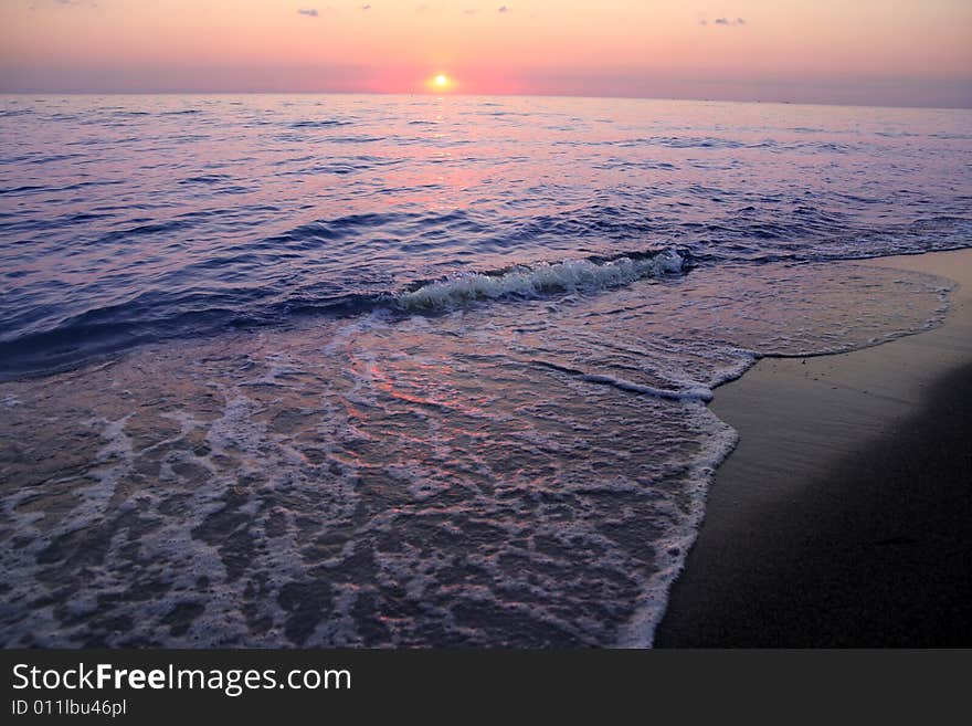 Details of ocean and sunrise in Greece