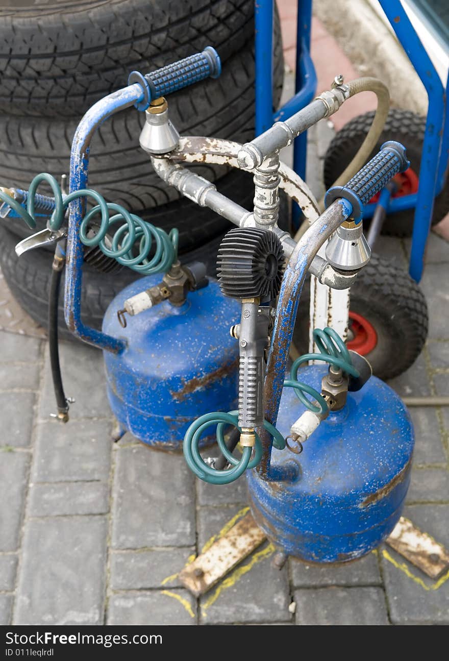 Blue canisters with air for wheels. Blue canisters with air for wheels