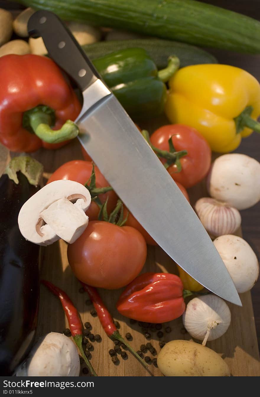 Some fresh vegetables on a wooden board