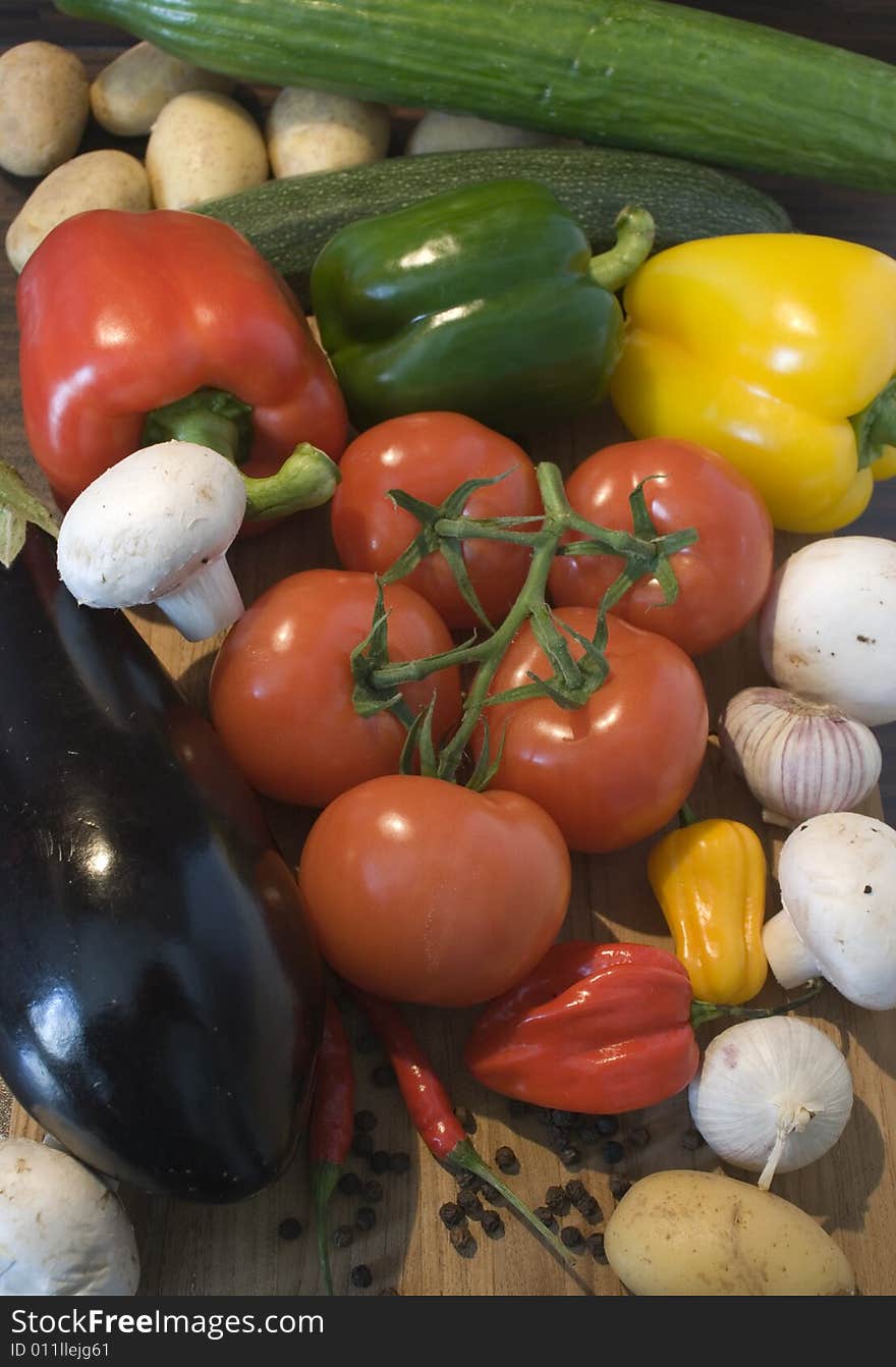 Some fresh vegetables on a wooden board