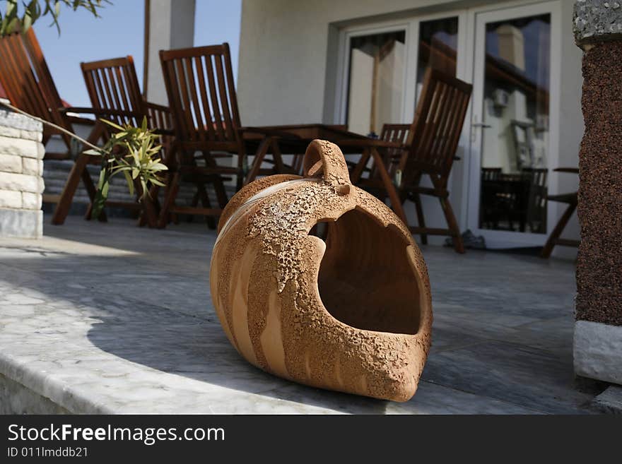 Open vase on a terrace. Open vase on a terrace