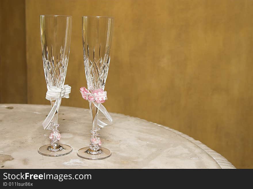 Two champagne glasses for the bride and groom. Two champagne glasses for the bride and groom