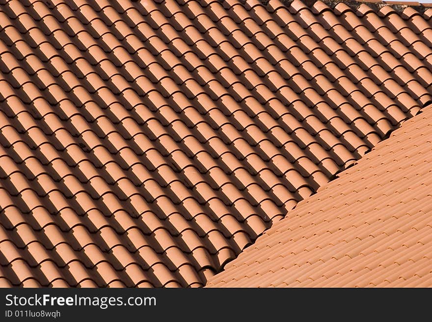 Two red tile roofs forming an angle