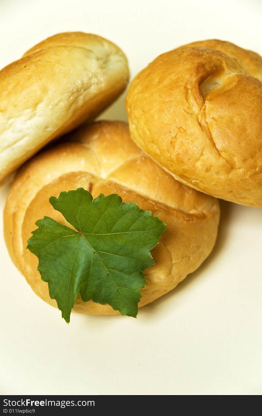 Bread roll on kitchen table.