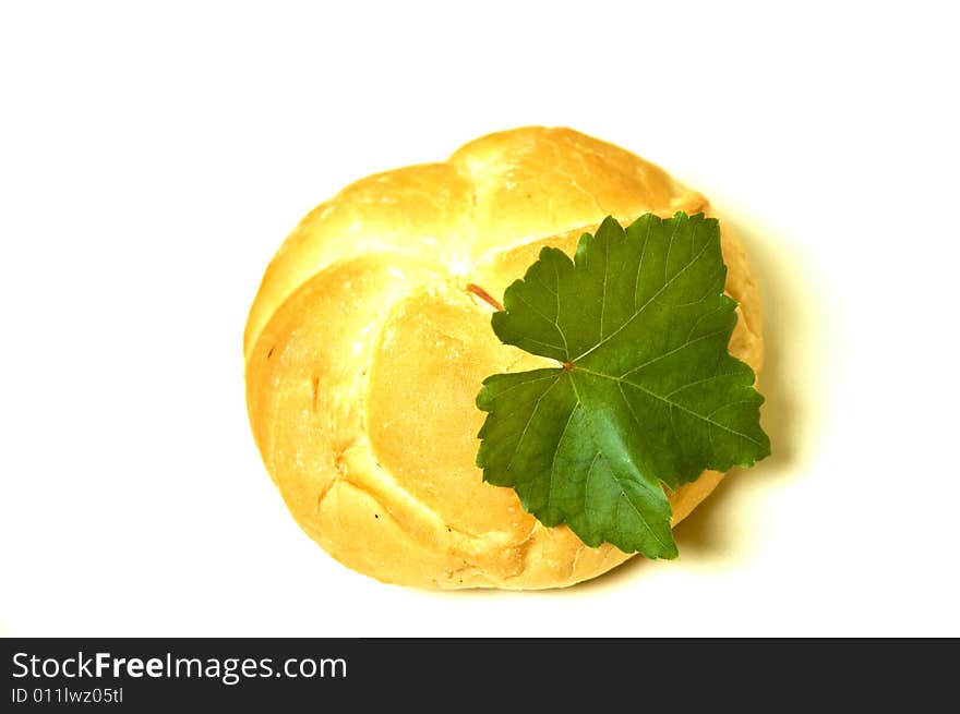 Bread roll on kitchen table.