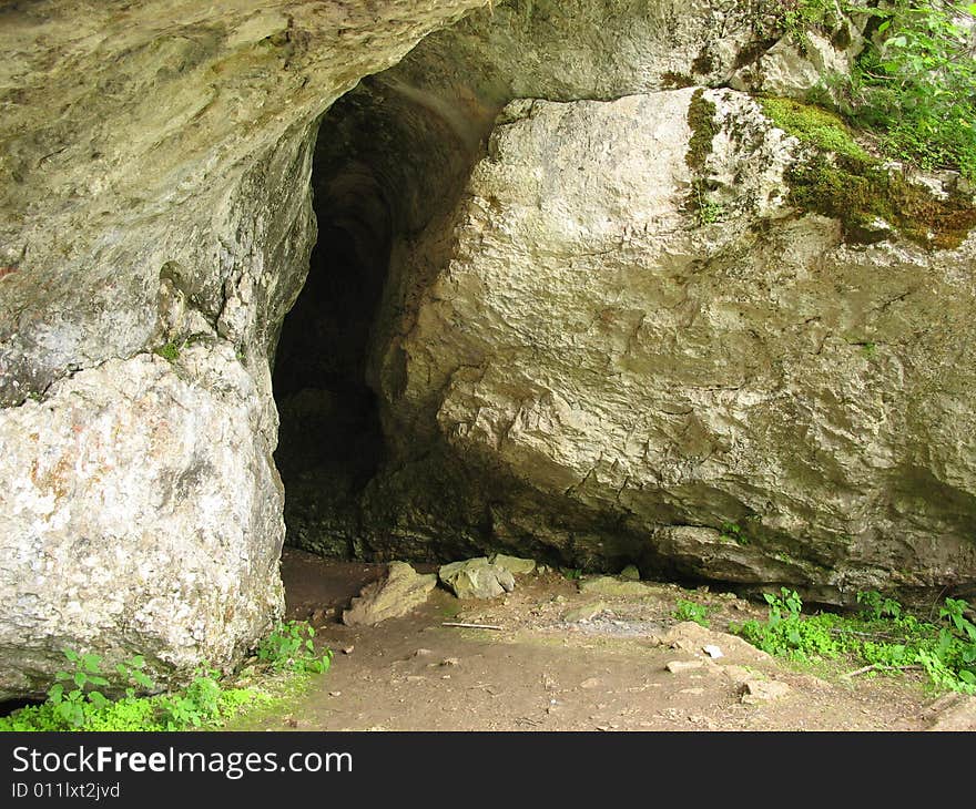 Enter in a dark and wet cave. Enter in a dark and wet cave