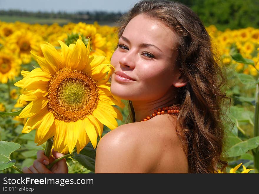 Portrait of the beautiful girl with flowers. Portrait of the beautiful girl with flowers