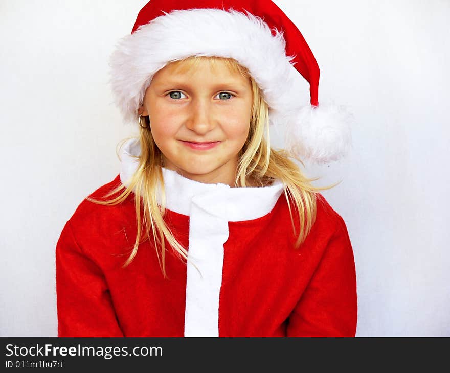 Smiling girl in santa hat