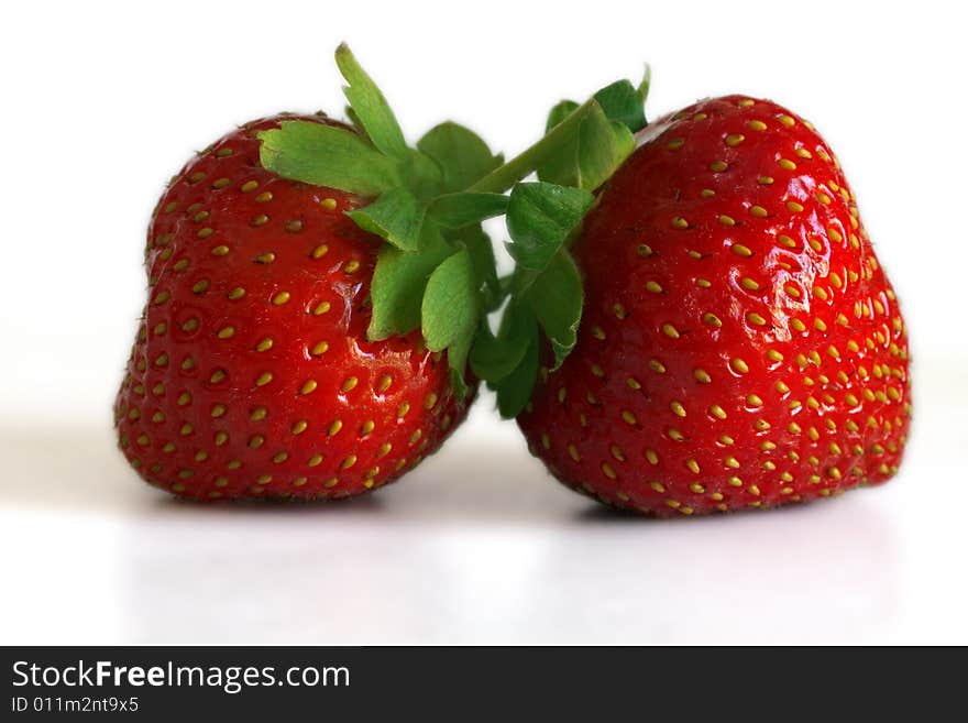 Berries of a fresh, ripe strawberry on a white background