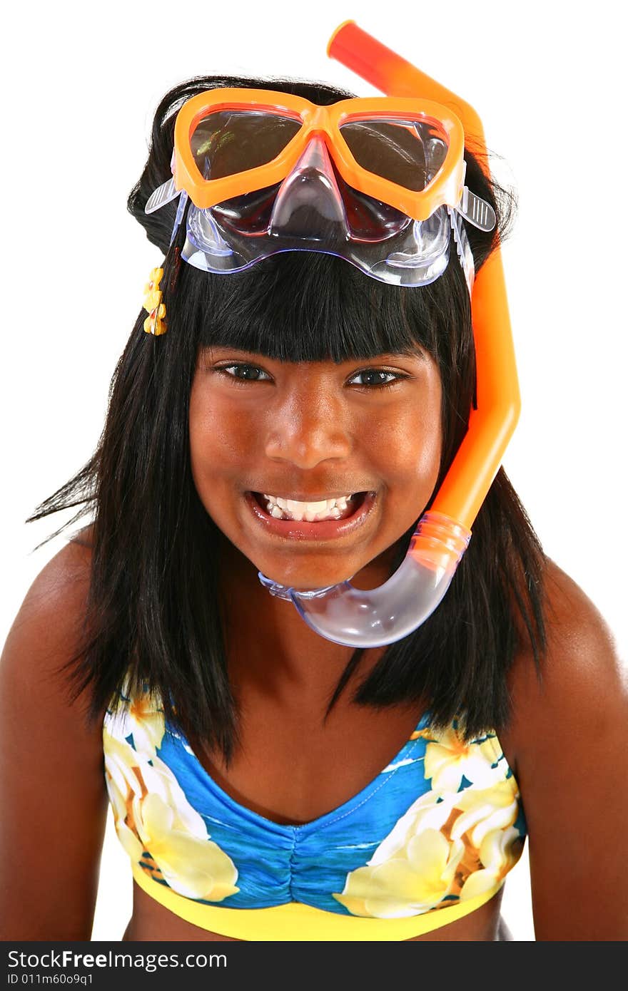 Adorable 10 year old Indian girl with snorkel and mask.