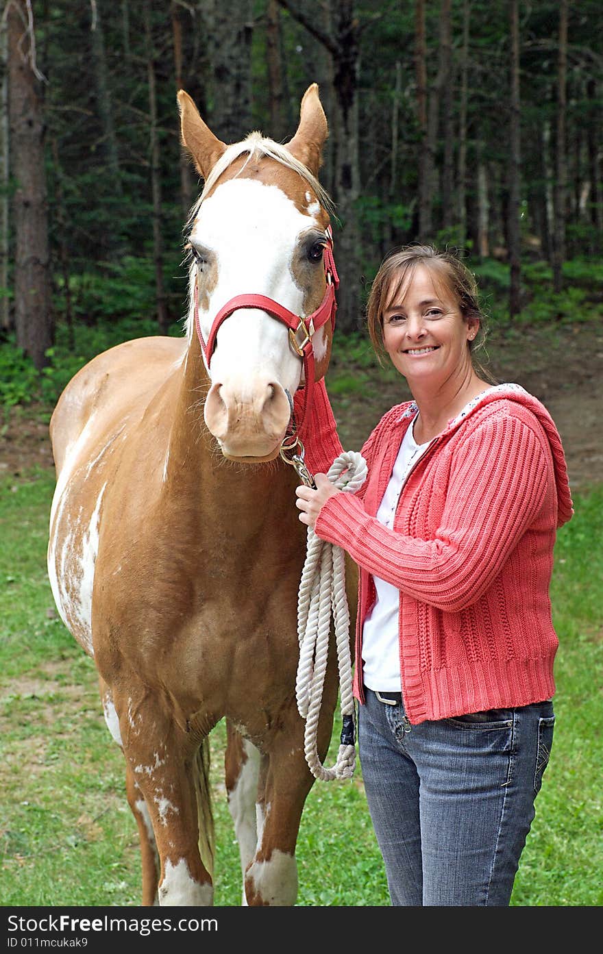 A Painted horse gets comfortable with his rider before setting off on the trail. A Painted horse gets comfortable with his rider before setting off on the trail.