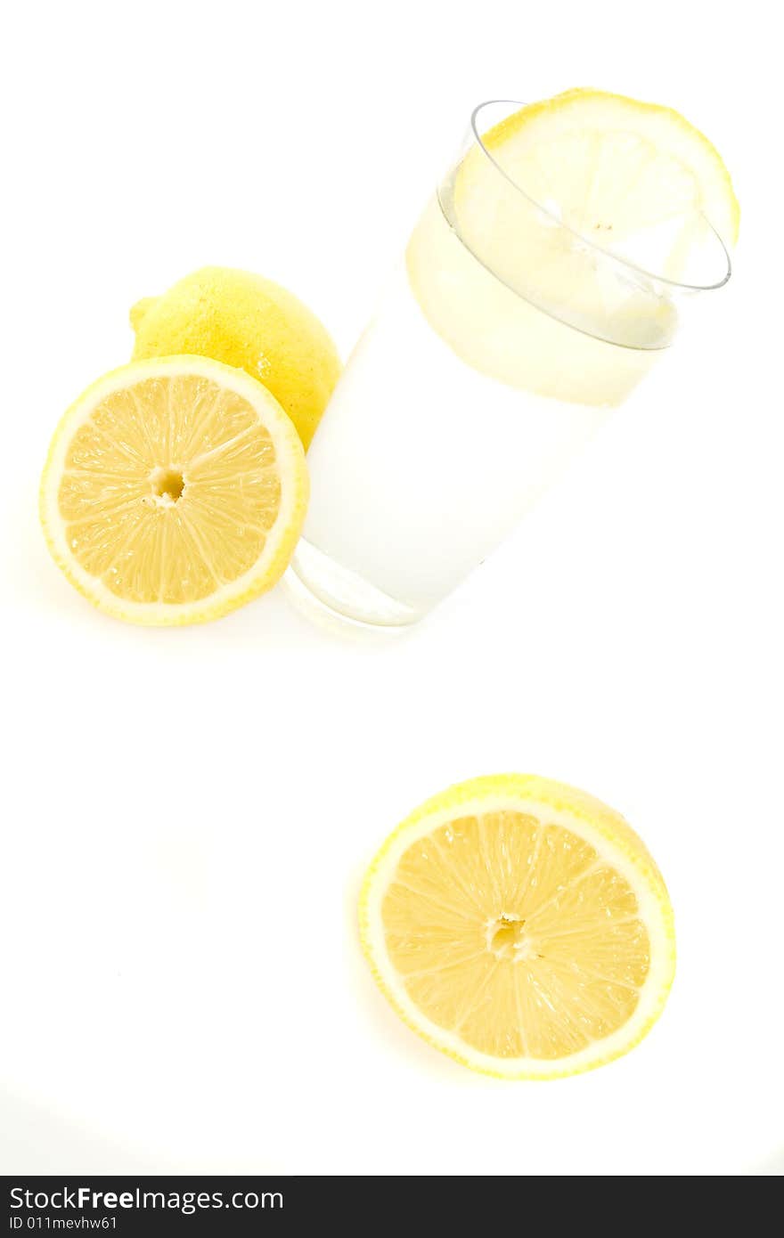 Lemonade with lemons isolated on white