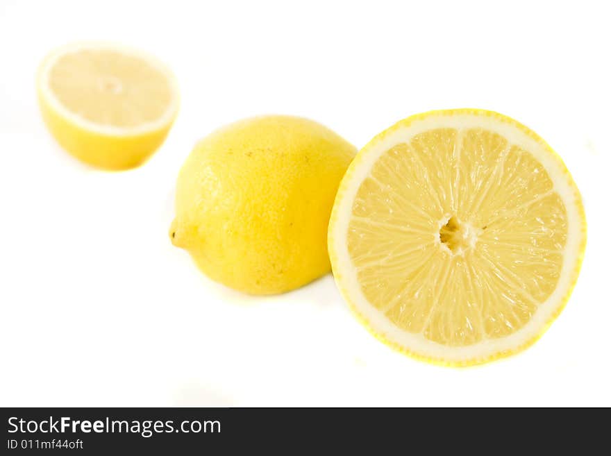 Yellow lemons isolated on white