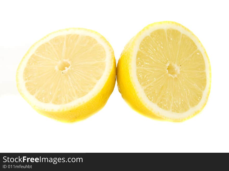 Yellow lemons isolated on white