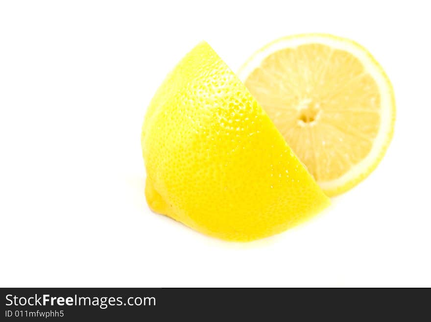 Yellow lemons isolated on white