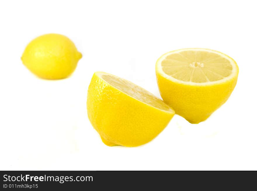 Yellow lemons isolated on white