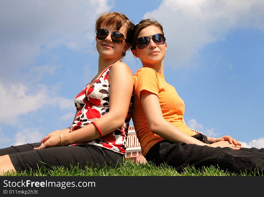 Friends sitting on the grass