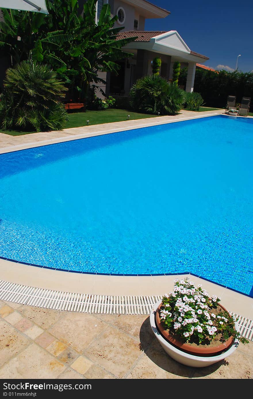 Private pool behind a luxury house. Private pool behind a luxury house