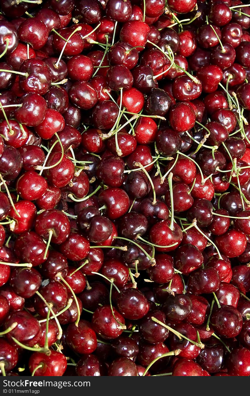 Photo of cherries. Vertically framed photo. Photo of cherries. Vertically framed photo.