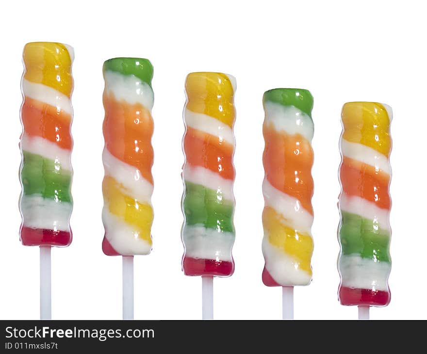 Five lollipop sticks isolated over white background.