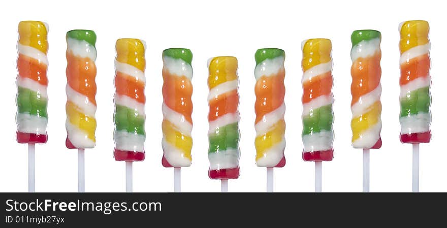 Nine lollipop sticks on a V shape isolated over white background.