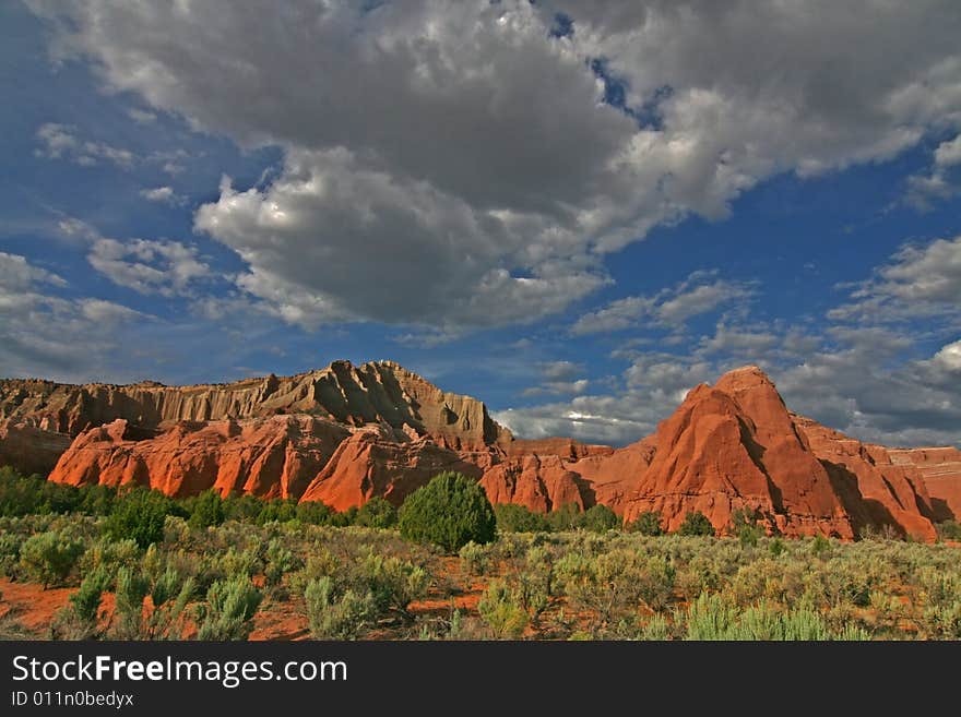 View of the red rock formations in Kodachrome Basin with blue skys and clouds