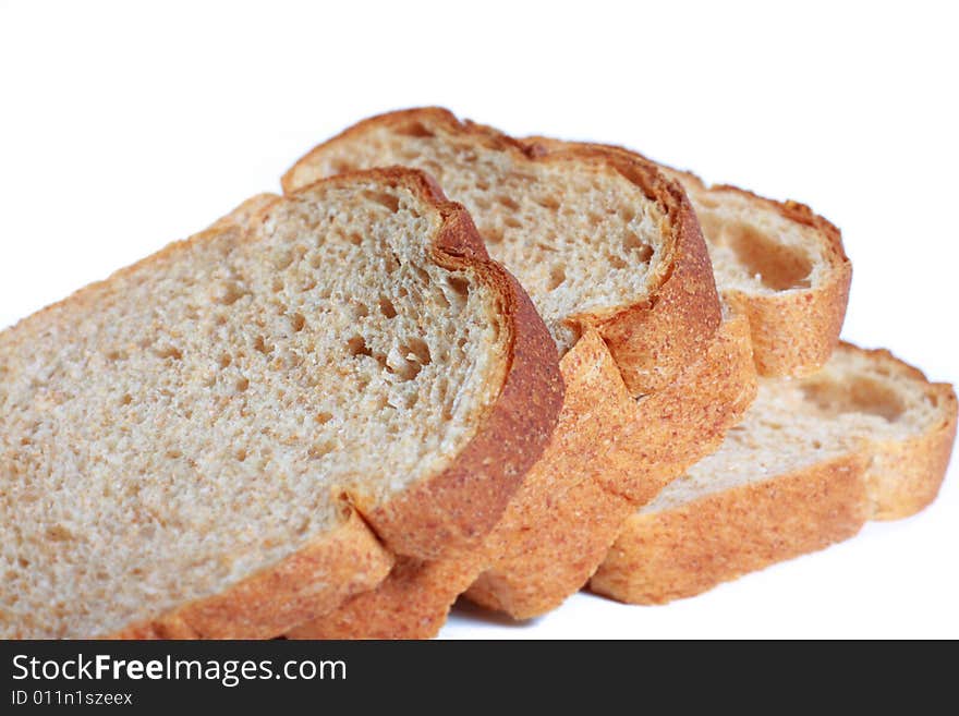 Four slices of bread isolated on white background. Four slices of bread isolated on white background.