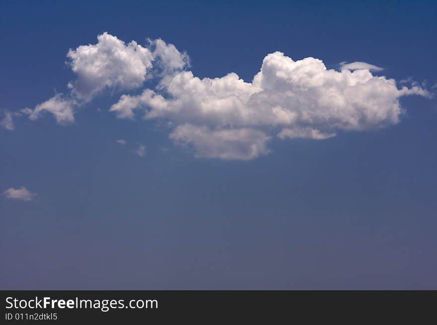 Puffy Clouds on a blue sky.