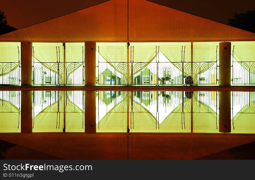 In the Olympic Games security check tent and the water inverted image constituted an unusual scenery. In the Olympic Games security check tent and the water inverted image constituted an unusual scenery