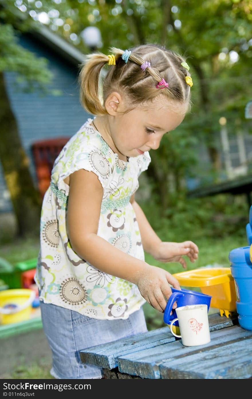 Playing little girl playing outdoor