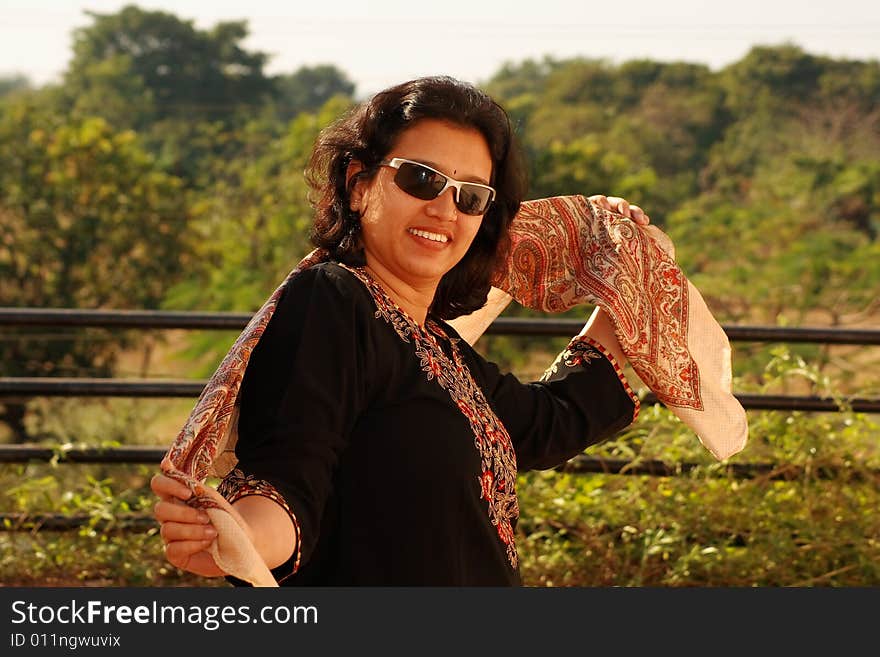 A young Indian woman dancing in an extremely romantic mood.