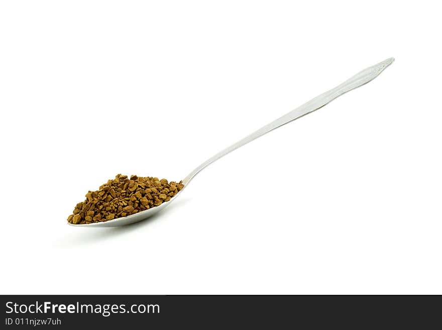 Isolated photo of a spoon felled with coffee. Isolated photo of a spoon felled with coffee