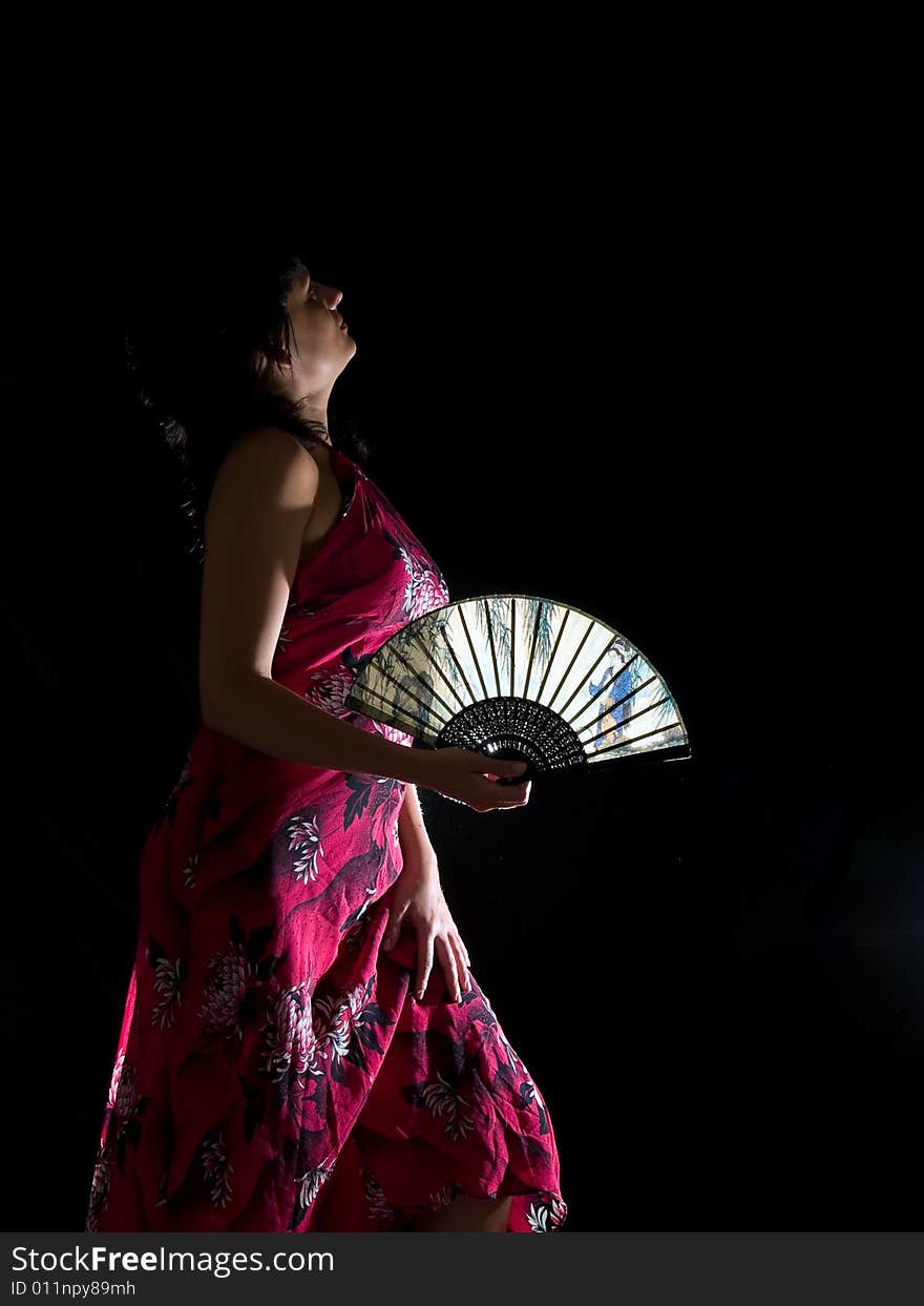 Lady With Feather In Night