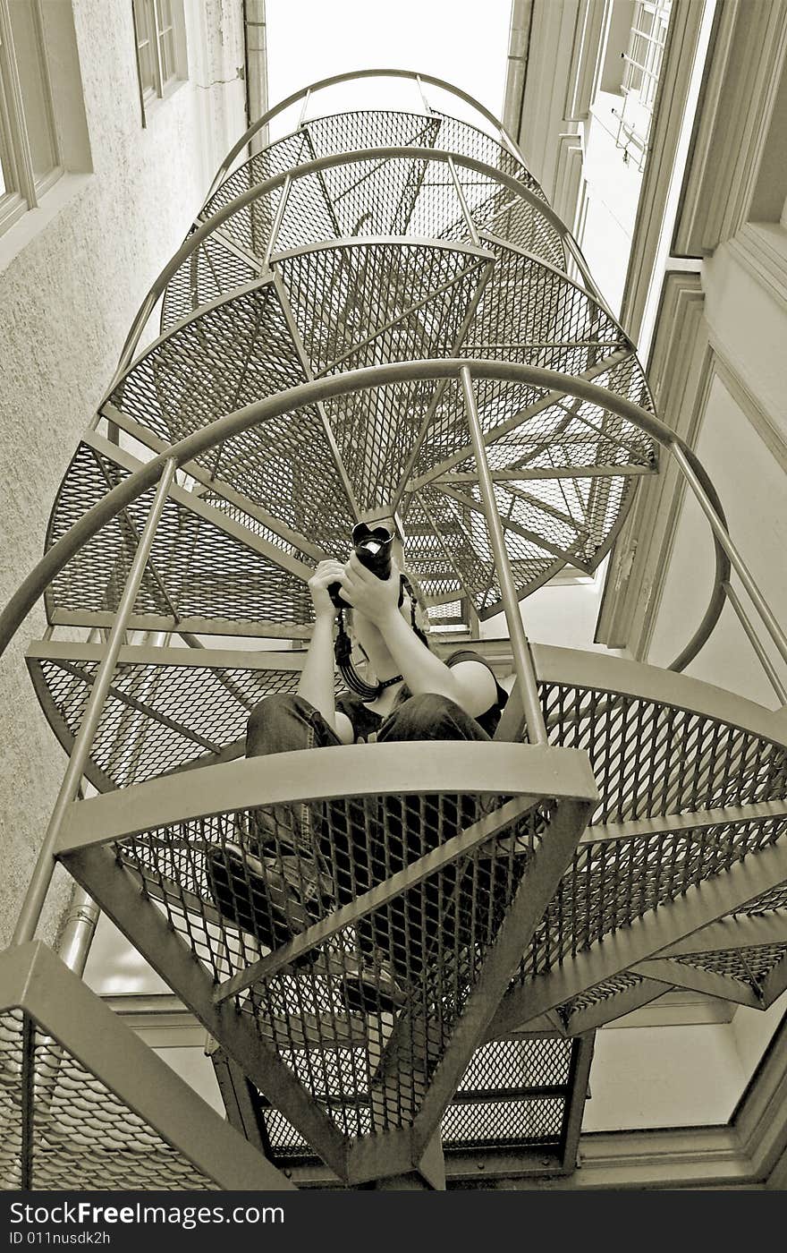 The photographer on spiral staircase. The photographer on spiral staircase.