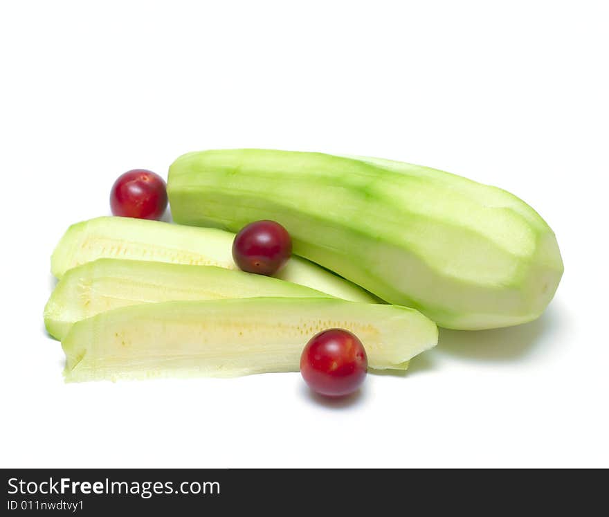 Vegetables marrow and fruit plum isolated on white