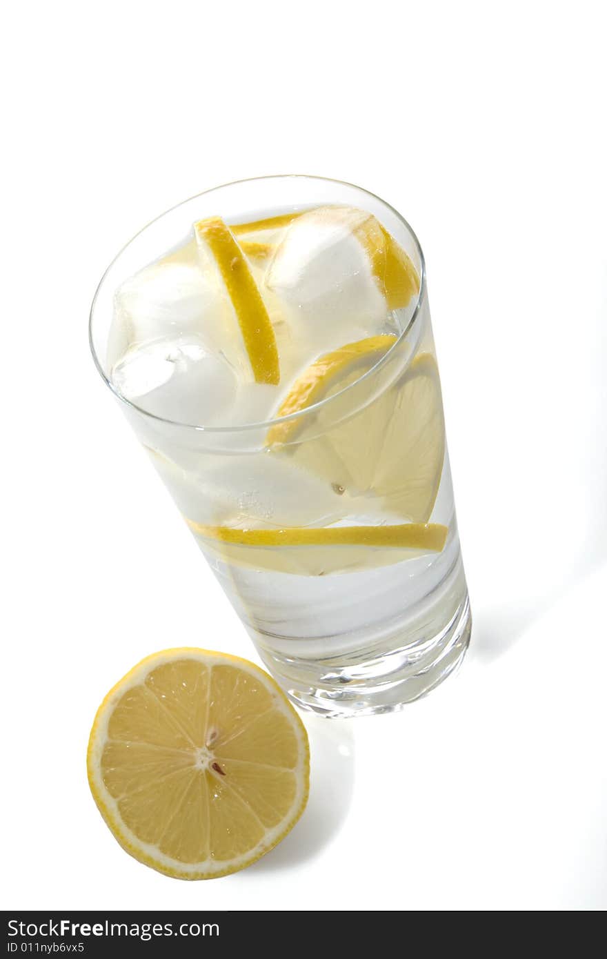 Glass of cold water on white background