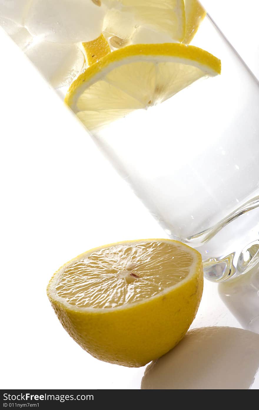 Glass of cold water on white background