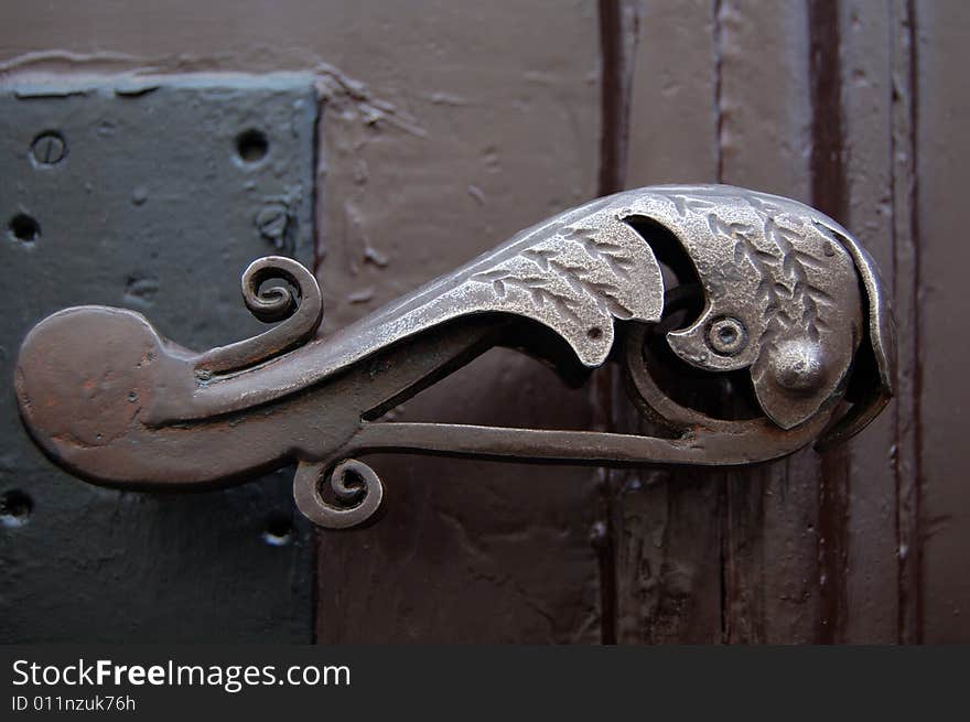 Old rusty door handle, rusty metal