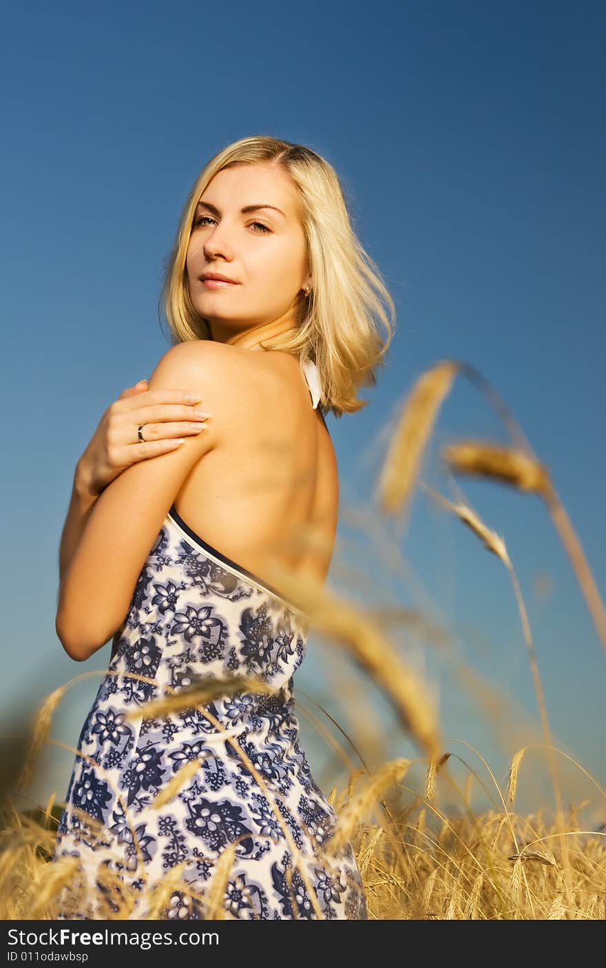 Woman In The Wheat Field