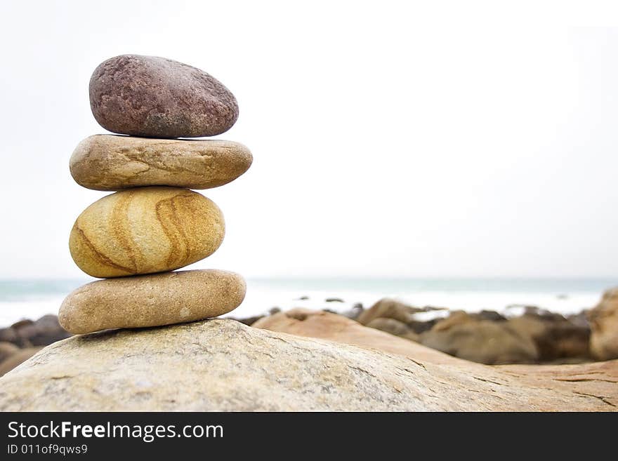 Stacked Stones In A Coastal Setting