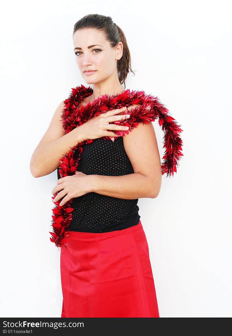 Beautiful woman in a Christmas outfit isolated. Beautiful woman in a Christmas outfit isolated.