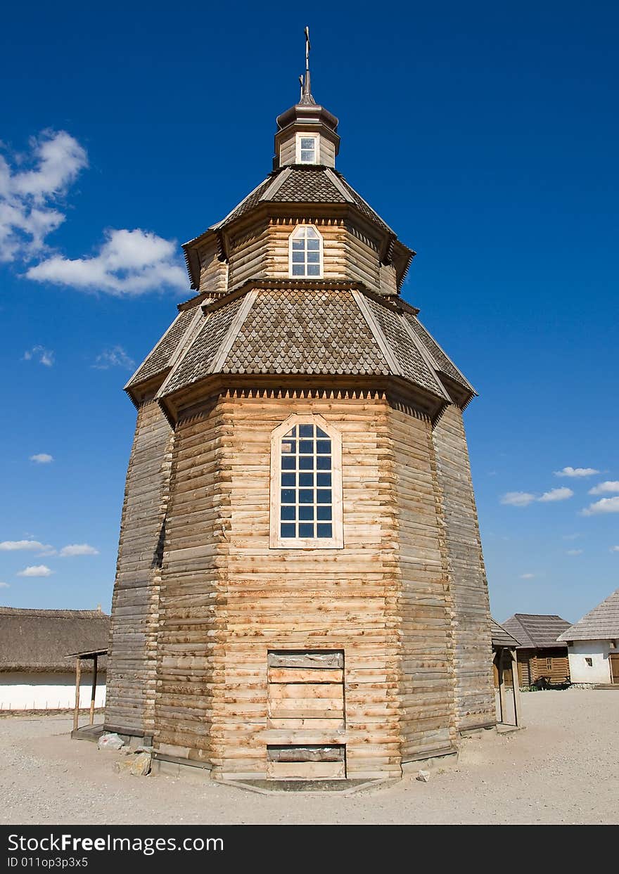 Old wooden orthodox church and blue sky. Old wooden orthodox church and blue sky