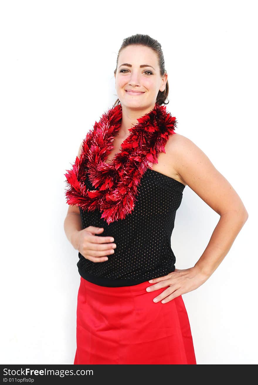 Portrait of a beautiful young brunette woman with tinsel for Christmas - isolated. Portrait of a beautiful young brunette woman with tinsel for Christmas - isolated.